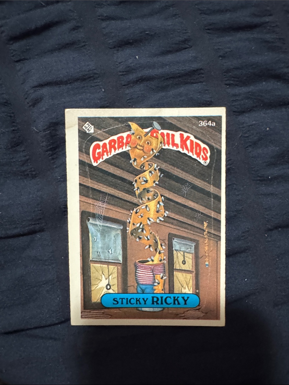 Garbage Pail Kids 'Sticky Ricky' Collectible Card - Yellow & Blue